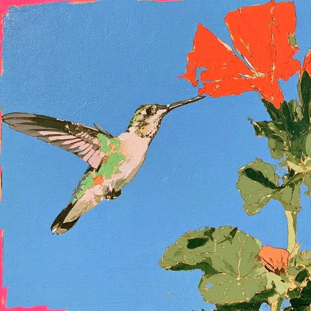 A small pale hummingbird hovers beside a coral-orange bloom and green leaves within a pink-edged blue frame.