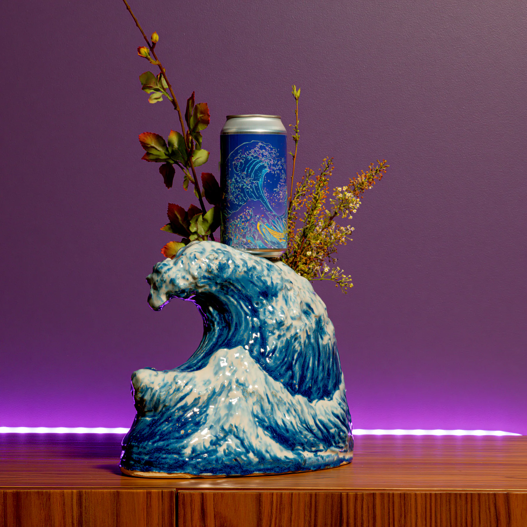 Blue wave pedestal holding flowers